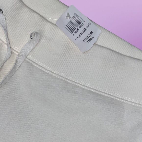 NWT Lady Footlocker Spark Fleece Capri Off White Size Small - Picture 3 of 5